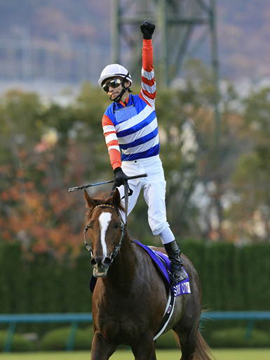 写真・佐藤哲とエスポワールシチー